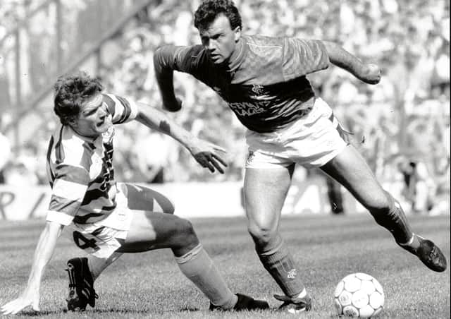 Rangers winger Davie Cooper bamboozles Celtic's Roy Aitken during an Old Firm clash in 1989. Picture: Brian Stewart