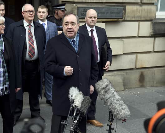 Alex Salmond speaks to reporters on Monday after being cleared of all charges at the High Court in Edinburgh