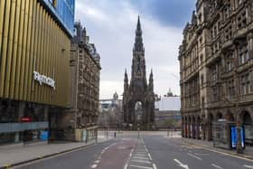 The streets of central Edinburgh may empty during lockdown, but the capital's economy continues to function. Picture: Mark Scates/SNS