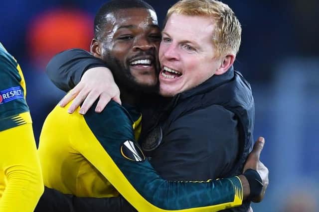 Lennon with matchwinner Olivier Ntcham after securing home and away victories over Lazio at the Stadio Olimpico in Rome. Picture: Craig Williamson / SNS Group)