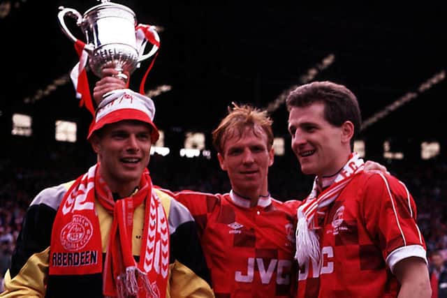 Aberdeen trio Theo Snelders (left), Alex McLeish (centre) and Brian Irvine celebrate the Scottish Cup final win over Celtic. Picture: SNS
