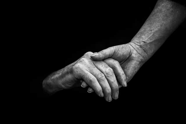 Deprived of touch and stimulation from loved ones, elderly residents of care homes may become depressed. Photograph: John Devlin