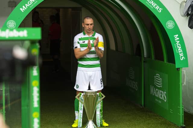 Celtic captain Scott Brown with the Ladbrokes Premiership trophy before the match against St Johnstone at Celtic Park in August. Picture: Craig Foy/SNS