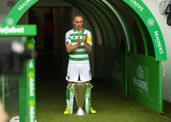 Celtic captain Scott Brown with the Ladbrokes Premiership trophy before the match against St Johnstone at Celtic Park in August. Picture: Craig Foy/SNS