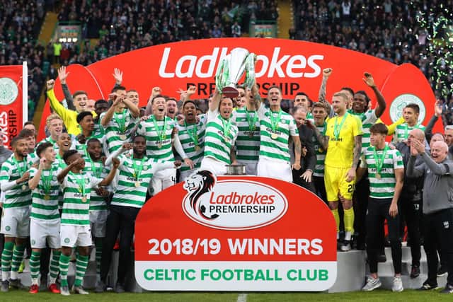 Celtic celebrate last season's title win, their eighth in a row. Picture: Ian MacNicol/Getty