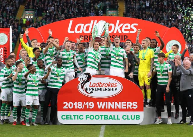 Celtic celebrate last season's title win, their eighth in a row. Picture: Ian MacNicol/Getty