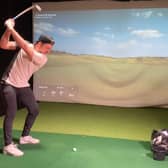 Connor Syme on his way to victory in the second BMW Indoor Invitational powered by TrackMan