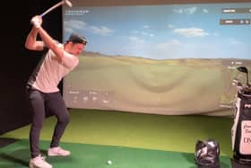 Connor Syme on his way to victory in the second BMW Indoor Invitational powered by TrackMan