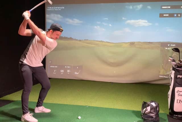 Connor Syme on his way to victory in the second BMW Indoor Invitational powered by TrackMan