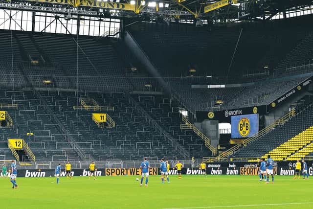 Bundesliga action returned in Germany yesterday but there was no 'Yellow Wall' for Dortmund's win over Schalke. Picture: Martin Meissner/AFP/Getty