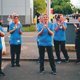 Staff at the Queen Elizabeth Hospital in Glasgow join in the Clap for Carers and key workers last week. Picture: 
Jeff Mitchell/Getty