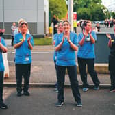 Staff at the Queen Elizabeth Hospital in Glasgow join in the Clap for Carers and key workers last week. Picture: 
Jeff Mitchell/Getty