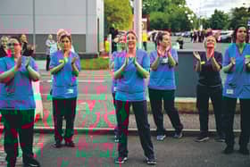 Staff at the Queen Elizabeth Hospital in Glasgow join in the Clap for Carers and key workers last week. Picture: 
Jeff Mitchell/Getty