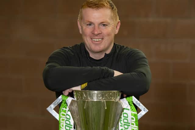 Neil Lennon with the Ladbrokes Premiership trophy at Lennoxtown.