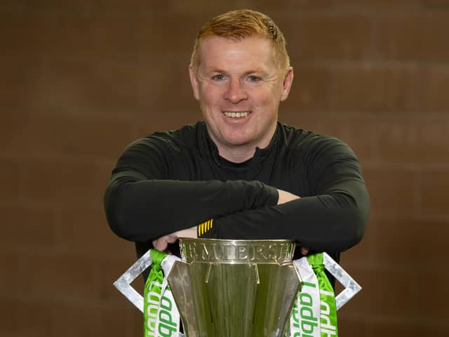Neil Lennon with the Ladbrokes Premiership trophy at Lennoxtown.
