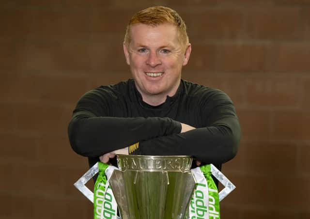 Neil Lennon with the Ladbrokes Premiership trophy at Lennoxtown.