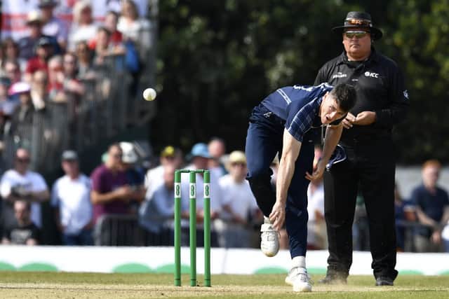 Chris Sole sends down a delivery during Scotland's famous one-day international win over England in June 2018. Picture: Rob Casey/SNS