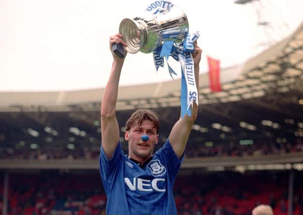 Duncan Ferguson celebrates with the FA Cup - and blue nose - after Everton's Wembley win over Manchester United