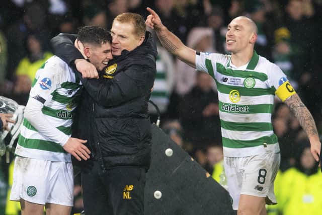 Ryan Christie gets a hug from Neil Lennon after Celtic's Betfred Cup final win over Rangers in December. Picture: Craig Foy/SNS