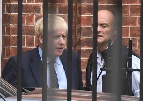 Prime Minister Boris Johnson with his senior aide Dominic Cummings in Downing Street