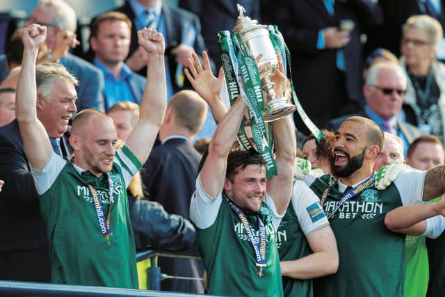 Lewis Stevenson lifts the Scottish Cup at Hampden in 2016 after Hibs’ dramatic victory over Rangers in the final. Picture: Alan Harvey/SNS