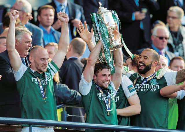 Lewis Stevenson lifts the Scottish Cup at Hampden in 2016 after Hibs’ dramatic victory over Rangers in the final. Picture: Alan Harvey/SNS