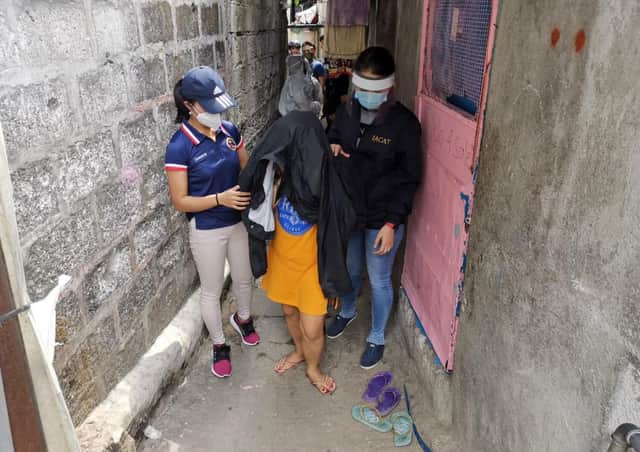 Authorities in Manila rescue a young girl forced to perfrom sexual  acts online for paying customers to watch. The Philipinnes is recognised as a global hotspot for cybersex trafficking
