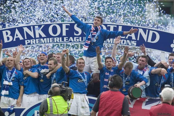 Shota Arveladze leads the Rangers title celebrations at Easter Road. Aubrey Washington/SNS