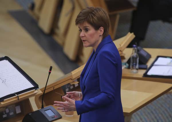 First Minister Nicola Sturgeon, at Holyrood yesterday, as she announced that golf, along with tennis, bowls and angling, would be allowed in the first stage of the lifting of lockdown. Picture: Getty