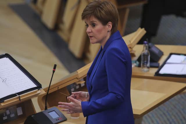 First Minister Nicola Sturgeon, at Holyrood yesterday, as she announced that golf, along with tennis, bowls and angling, would be allowed in the first stage of the lifting of lockdown. Picture: Getty