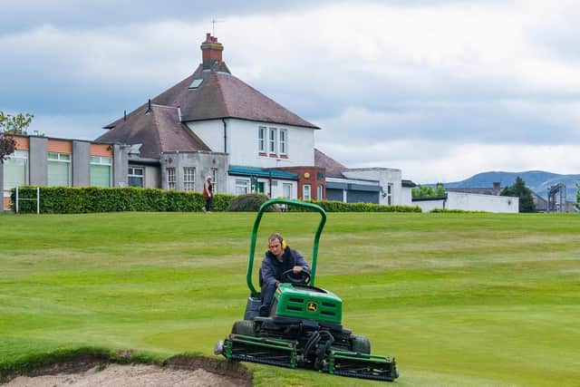 A greenkeeper getting Carrick Knowe, one of Edinburgh Leisure's venues, ready for the reopening of golf courses, which will be part of phase one of the Scottish Government's lockdown exit route map. Picture: SNS