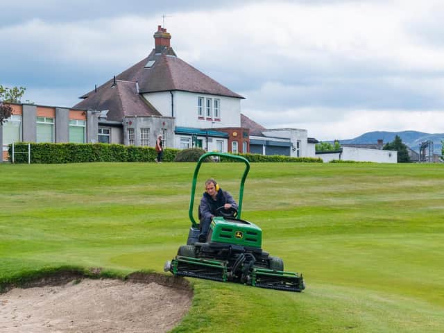 A greenkeeper getting Carrick Knowe, one of Edinburgh Leisure's venues, ready for the reopening of golf courses, which will be part of phase one of the Scottish Government's lockdown exit route map. Picture: SNS