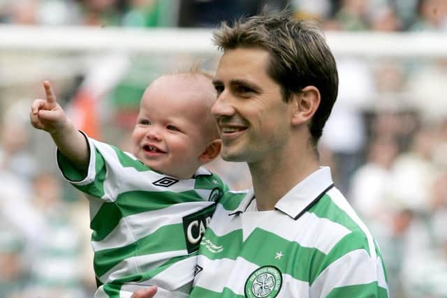 Jackie McNamara at his testimonial match in 2005 with his then one-year-old son, Sidney, who is now 16 and in the Hibs academy set-up. Picture: Steve Welsh/PA