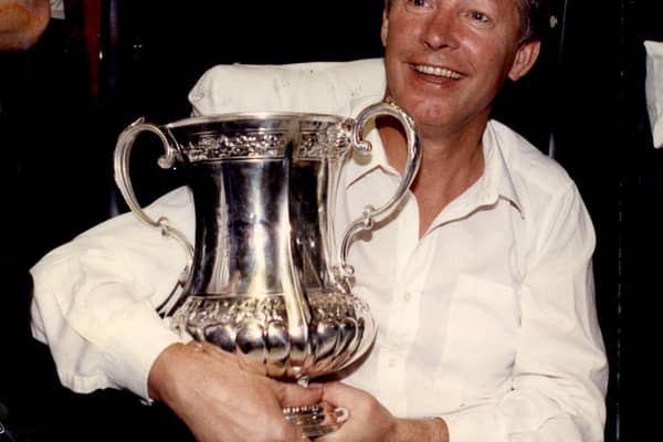 Sir Alex Ferguson with the FA Cup in 1990 after Manchester United's victory over Crystal Palace in the Cup final replay. Picture: Jim Hutchison/ANL/Shutterstock