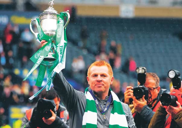 Celtic manager Neil Lennon with the Scottish Cup following last year's final triumph against Hearts. Picture: Craig Foy/SNS