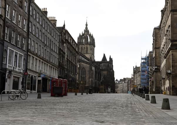 The Royal Mile in Edinburgh – usually a magnet for tourists – is deserted as the lockdown continues (Picture: Lisa Ferguson)