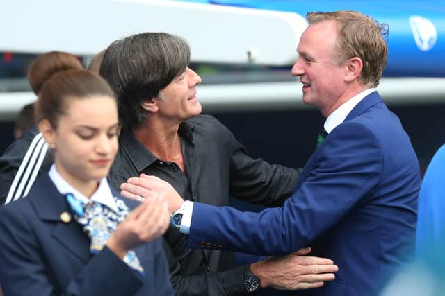 Michael O'Neill greets Joachim Low ahead of the Euro 2016 match between Northern Ireland and Germany in Paris. Picture: Alexander Hassenstein/Getty Images