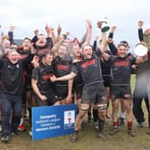 The Biggar players celebrate their title 'win'.