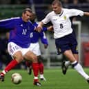 Dominic Matteo takes on Zinedine Zidane during a friendly match between Scotland and France in Paris 2002. Picture: SNS