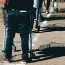 Remember to keep your distance while queueing. Picture: David Rogers/Getty