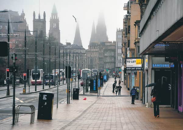 A deserted Princes Street illustrates the grim statistics. Picture: Andy Buchanan/Getty