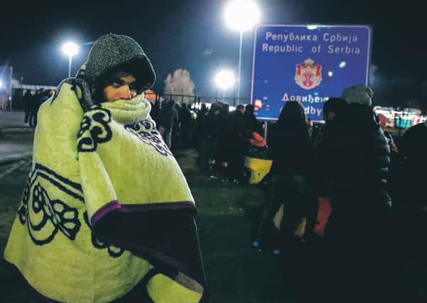 Migrants camp beside the border fence at the Serbian-Hungarian border, which has been temporarily closed by the Hungarian police (Picture: Istvan HusztiAFP via Getty Images)