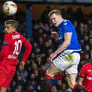 George Edmundson heads home Rangers’ goal in the 3-1 Europa League defeat by Bayer Leverkusen at Ibrox, the last game in Scotland before the shutdown. Picture: Craig Williamson/SNS