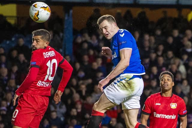 George Edmundson heads home Rangers’ goal in the 3-1 Europa League defeat by Bayer Leverkusen at Ibrox, the last game in Scotland before the shutdown. Picture: Craig Williamson/SNS