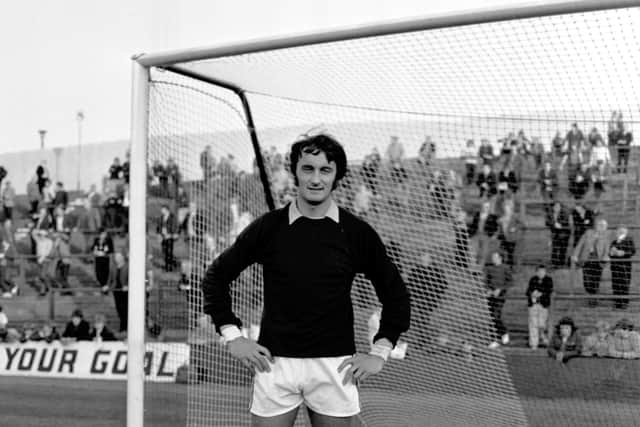 Jim Herriot limbers up before a Hibs-Dundee fixture at Easter Road in August 1971.