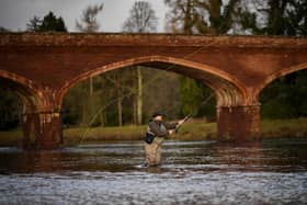 Anglers attend the opening day of the salmon fishing season on the River Tay at Kincalven bridge. Picture: Jeff J Mitchell/Getty Images