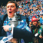 St Johnstone manager Tommy Wright clutches the Scottish Cup after the club's 2014 success. Picture: Craig Williamson/SNS