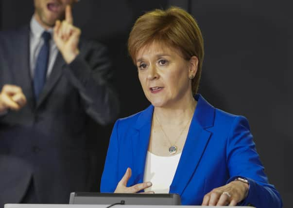 Nicola Sturgeon has said she is 'cautious' about a Covid-19 tracking app