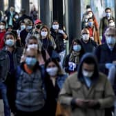 Commuters return to work in Milan, Italy. Britain is facing a similar challenge to get employees back into work and to restart the UK economy. Picture: Claudio Furlan/LaPresse via AP