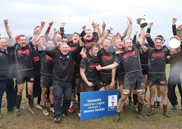 Biggar celebrate their title 'win' before the season was declared null and void.